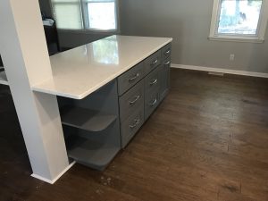 Gray shaker cabinets with white top in Boiling Springs, SC