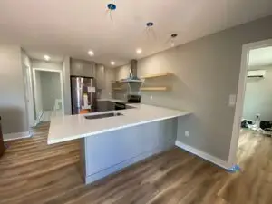 Small kitchen installed cabinets and countertops